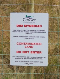 Contaminated land sign on minor road near to Llyn Bodgynydd. Photo by Keith Evans cc at sa 2.0
