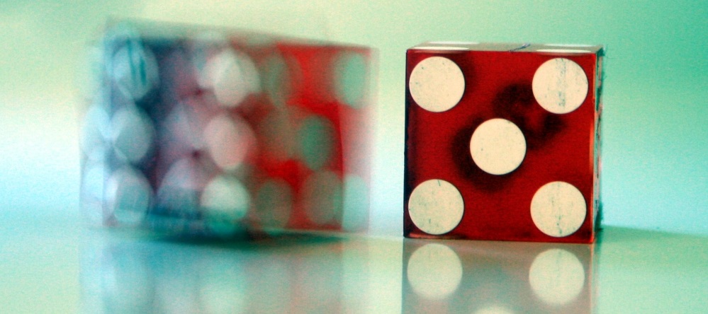 Photo of a dice showing the number five