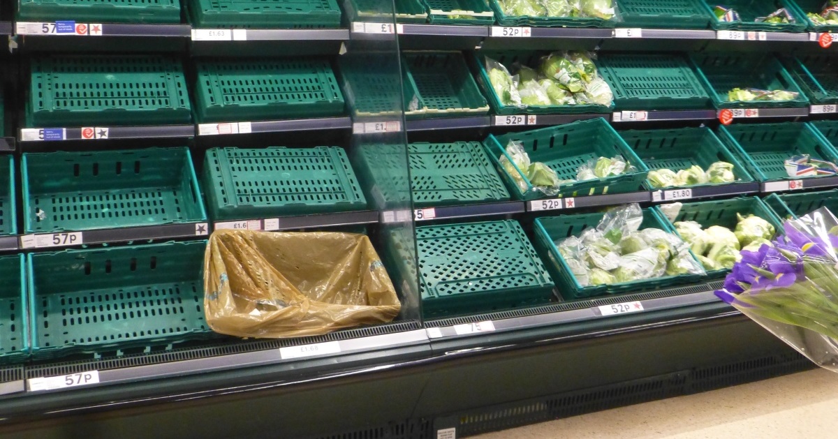 Empty vegetable supermarket shelves