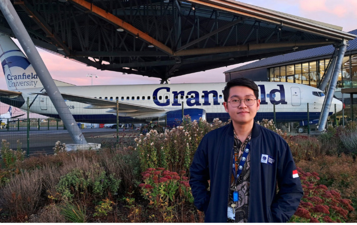 William in front of Cranfield's Boeing 737-800