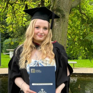 Sadie Stewart in a graduation gown at the University of Nottingham